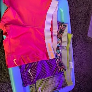 (3) pairs of Nike compression shorts